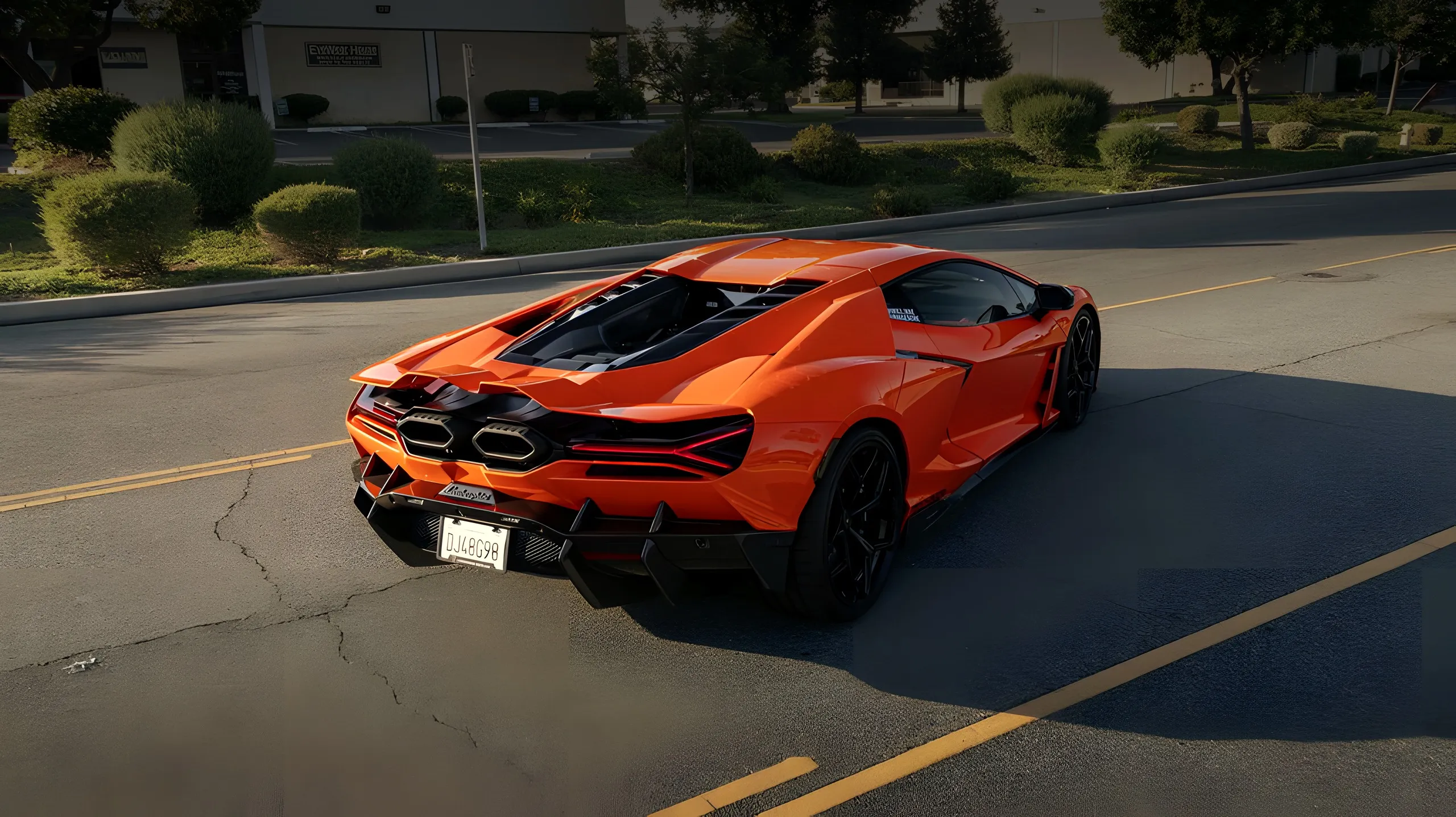 Lamborghini Revuelto rear three-quarter in orange paint protection film by Wrap Labs