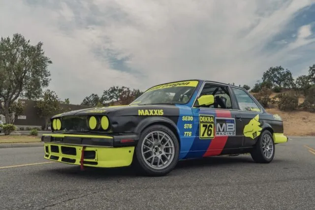 BMW E30 Race Car Full Livery Vinyl Wrap Front Three Quarter Road, by Wrap Labs, Westlake Village