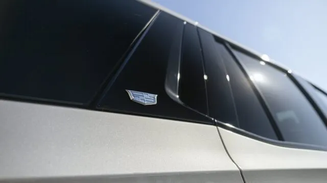 Cadillac Escalade Silver PPF Cadillac Badge Window Tint Detail