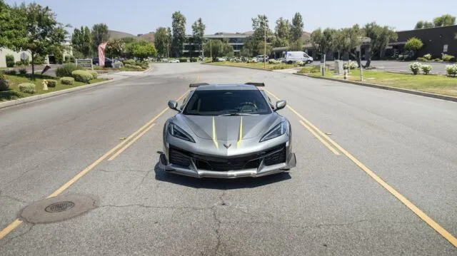 Corvette Z06 Grey Yellow Stripe Vinyl Wrap Front Head On Street