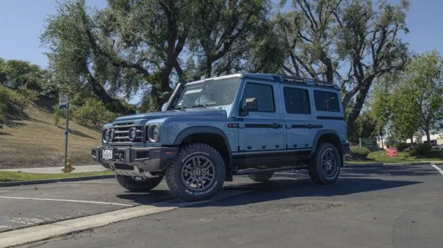 INEOS Grenadier Steel Blue PPF Front 3Quarter Parking Lot Trees, by Wrap Labs, Westlake Village