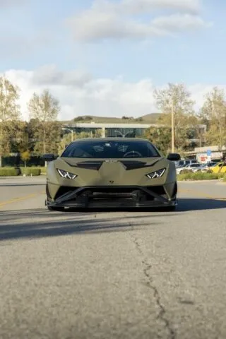 Lamborghini Huracan STO Matte Army Green Vinyl Wrap Front Head On Street Vertical