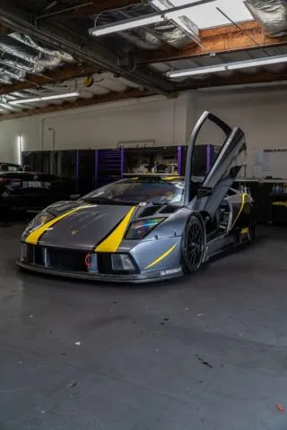Lamborghini Murcielago Race Car Matte Grey Yellow Stripes Vinyl Wrap Scissor Doors Open WrapLabs Shop, by Wrap Labs, Westlake Village