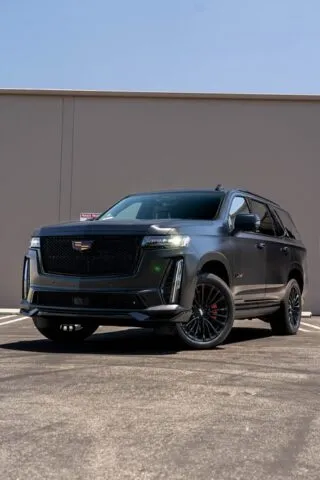 Cadillac Escalade V Dark Grey Front 3 4 Warehouse Wall