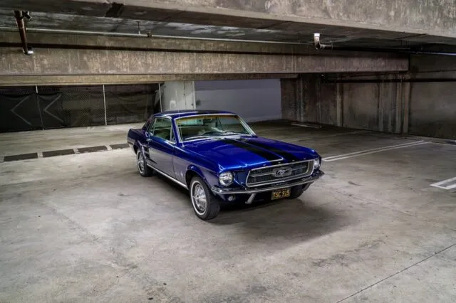 Ford Mustang Coupe Gloss Blue Vinyl Wrap Black Racing Stripes Front 3 4 Parking Garage, by Wrap Labs, Westlake Village