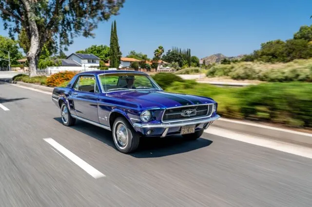 Ford Mustang Coupe Gloss Blue Vinyl Wrap Black Racing Stripes Front 3 4 Rolling Shot Hillside Road, by Wrap Labs, Westlake Village