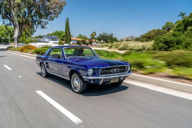 Ford Mustang Coupe Gloss Blue Vinyl Wrap Black Racing Stripes Front Rolling Shot Hillside Road, by Wrap Labs, Westlake Village
