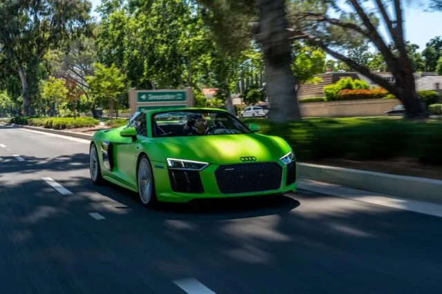 Audi R8 Spyder Lime Green Vinyl Wrap Front 3 4 Rolling Shot Palm Lined Road, by Wrap Labs, Westlake Village