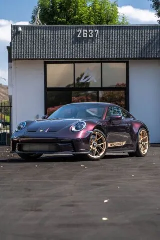 Porsche 911 Purple Gold Side Stripe Front 3 4 Low Angle
