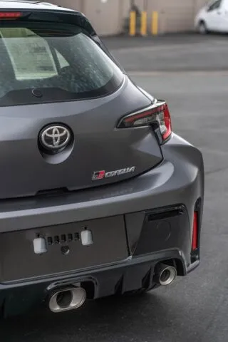 Toyota GR Corolla Satin Grey Rear Badge And Exhaust Detail
