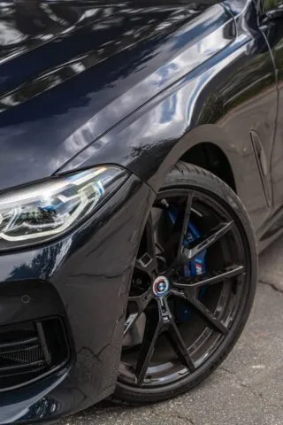 BMW 8 Series Convertible Gloss Black Front Wheel And Headlight Detail