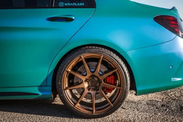 Mercedes AMG C63 Teal Blue Vinyl Wrap Rear Wheel Bronze Brake Caliper Detail, by Wrap Labs, Westlake Village