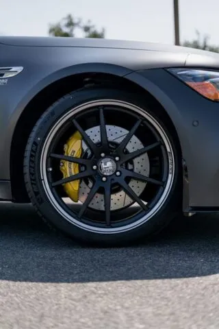 Mercedes AMG GT63S Matte Grey Vinyl Wrap Front Wheel Yellow Brake Detail, by Wrap Labs, Westlake Village