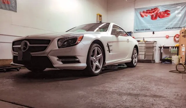 Mercedes-Benz SL550 White Vinyl Wrap Front 3 4 Indoor Shop, by Wrap Labs, Westlake Village
