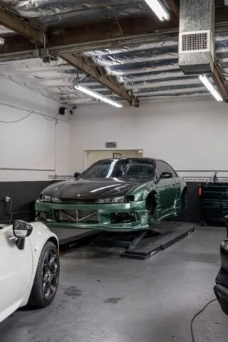 Nissan S14 Green Vinyl Wrap Shop Front