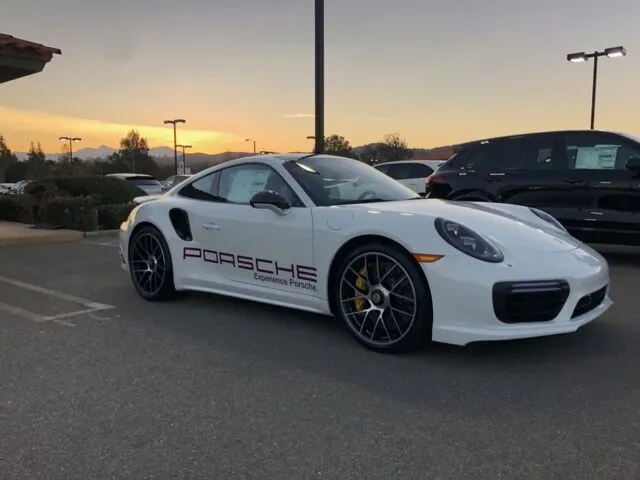 Porsche 911 Turbo S White Dealership Livery Vinyl Wrap Side Three Quarter Sunset