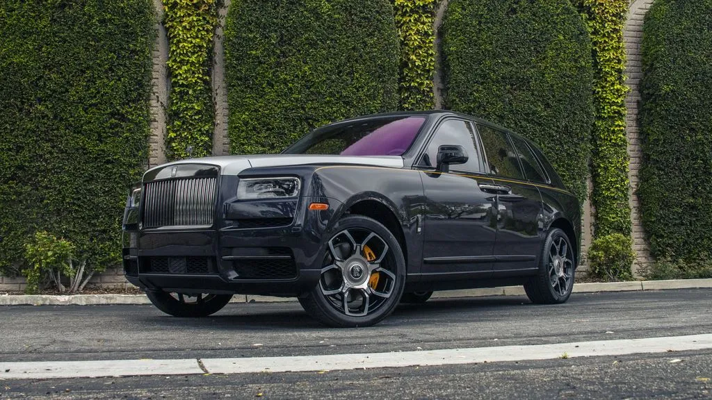 Rolls Royce Cullinan Black Silver Two Tone Purple Interior CPF Front 3Quarter Street Trees