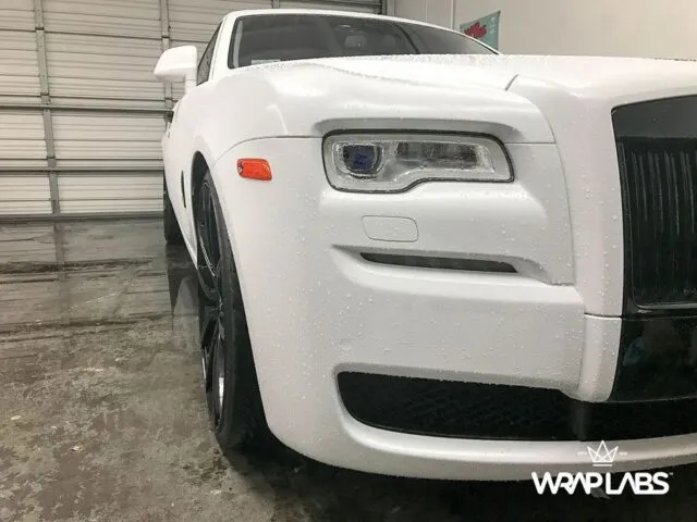 Rolls Royce Wraith White Vinyl Wrap Water Droplets Front Quarter Detail WrapLabs Shop