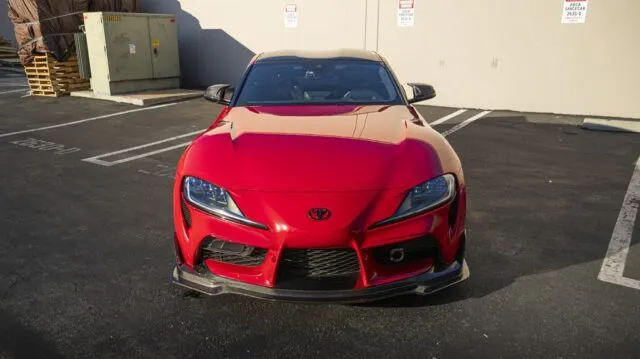 Toyota GR Supra Red PPF Carbon Splitter Front Head On Parking Lot