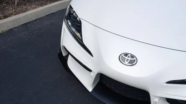 Toyota GR Supra White Paint Protection Film Hood Badge Overhead Detail