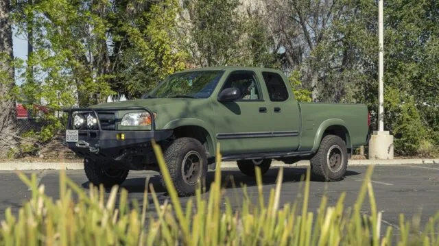 Toyota Tundra Matte Military Green Vinyl Wrap Front Low Grass Foreground
