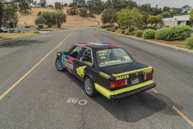 BMW E30 Race Car Full Livery Vinyl Wrap Rear Three Quarter Road, by Wrap Labs, Westlake Village