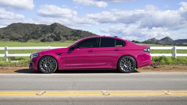 BMW M5 Fuchsia Pink Vinyl Wrap Side Profile Farmland Mountains, by Wrap Labs, Westlake Village