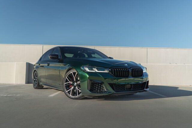 BMW M5 Gloss Green Vinyl Wrap Front 3 4 Parking Structure, by Wrap Labs, Westlake Village