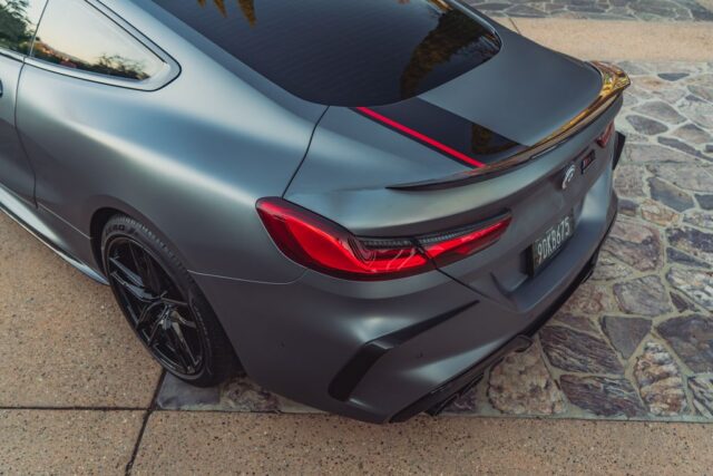 BMW M8 Competition Matte Grey Black Red Stripe Vinyl Wrap Rear Taillight Spoiler Overhead Detail, by Wrap Labs, Westlake Village