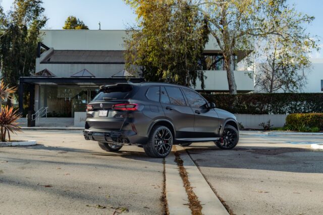 BMW X5 M Matte Black Vinyl Wrap Rear Three Quarter Street, by Wrap Labs, Westlake Village