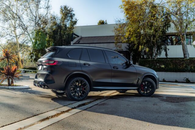 BMW X5 M Matte Black Vinyl Wrap Side Three Quarter Street, by Wrap Labs, Westlake Village