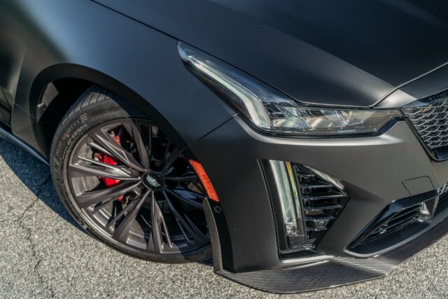 Cadillac CT5 V Blackwing Matte Black Vinyl Wrap Front Wheel Red Brake Carbon Splitter Detail, by Wrap Labs, Westlake Village