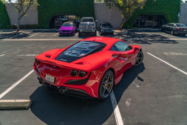 Ferrari F8 Tributo Red PPF Rear Overhead Parking Lot Purple BMW Background, by Wrap Labs, Westlake Village