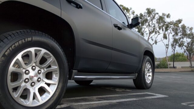 GMC Yukon Matte Black Vinyl Wrap Low Side Wheel Detail, by Wrap Labs, Westlake Village