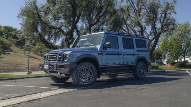 INEOS Grenadier Steel Blue PPF Front 3Quarter Parking Lot Trees, by Wrap Labs, Westlake Village