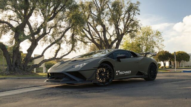 Lamborghini Huracan STO Matte Army Green Technica Vinyl Wrap Front 3Quarter Low Golden Hour Trees, by Wrap Labs, Westlake Village