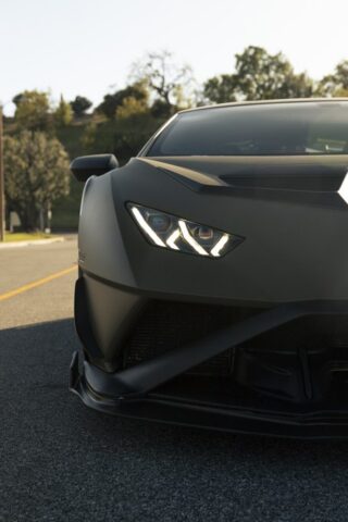 Lamborghini Huracan STO Matte Army Green Vinyl Wrap Headlight Front Close Up Dusk, by Wrap Labs, Westlake Village