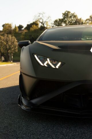 Lamborghini Huracan STO Matte Army Green Vinyl Wrap Headlight Front Close Up Golden Hour, by Wrap Labs, Westlake Village