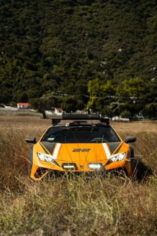 Lamborghini Huracan Sterrato Orange Vinyl Wrap Front Offroad Field, by Wrap Labs, Westlake Village