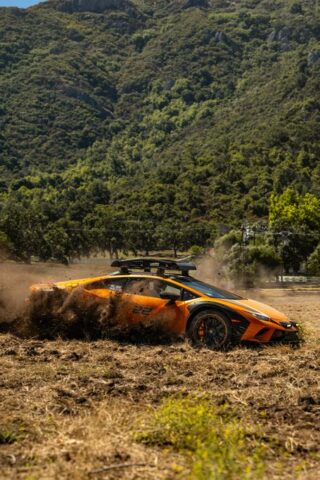Lamborghini Huracan Sterrato Orange Vinyl Wrap Side Action Dirt Roost Mountain 2, by Wrap Labs, Westlake Village