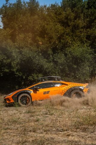 Lamborghini Huracan Sterrato Orange Vinyl Wrap Side Action Dust, by Wrap Labs, Westlake Village