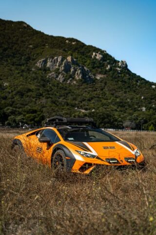 Lamborghini Huracan Sterrato Orange Vinyl Wrap Three Quarter Front Field, by Wrap Labs, Westlake Village