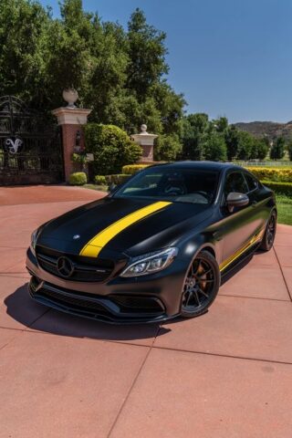 Mercedes AMG C63 S Matte Black Yellow Stripe Vinyl Wrap Front 3Quarter Estate Gate, by Wrap Labs, Westlake Village