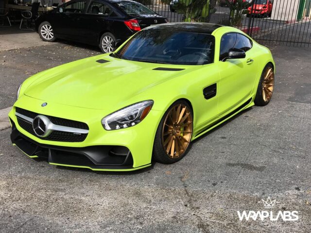 Mercedes AMG GT S Neon Lime Green Vinyl Wrap Gold Wheels Front Three Quarter WrapLabs Shop, by Wrap Labs, Westlake Village
