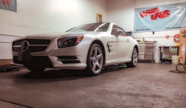 Mercedes SL550 White Vinyl Wrap Front Indoor WrapLabs Shop, by Wrap Labs, Westlake Village