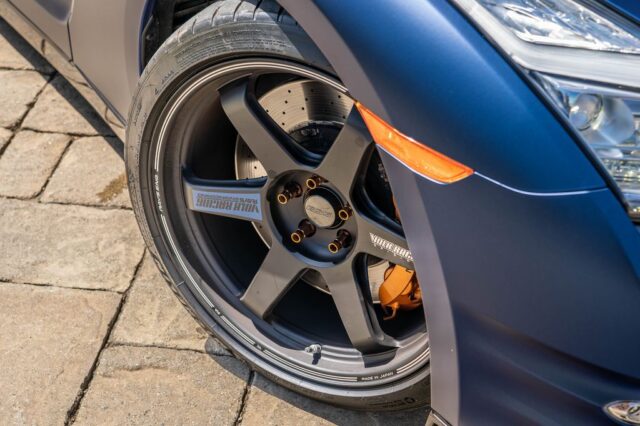 Nissan GT R R35 Matte Blue Vinyl Wrap Volk Racing Wheel Orange Caliper Closeup v1, by Wrap Labs, Westlake Village
