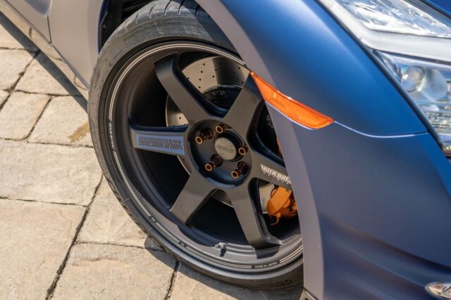 Nissan GT R R35 Matte Blue Vinyl Wrap Volk Racing Wheel Orange Caliper Closeup v2, by Wrap Labs, Westlake Village