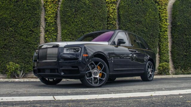 Rolls Royce Cullinan Black Silver Two Tone Purple Interior CPF Front 3Quarter Street Trees