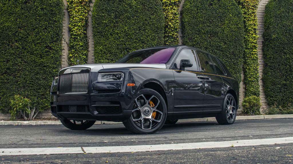 Rolls Royce Cullinan Black Silver Two Tone Purple Interior CPF Front 3Quarter Street Trees