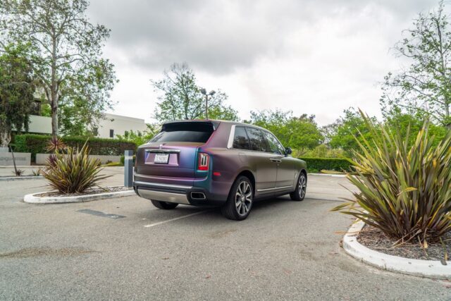 Rolls Royce Cullinan Color Shift Chameleon Vinyl Wrap Rear 3Quarter Parking Lot Plants, by Wrap Labs, Westlake Village